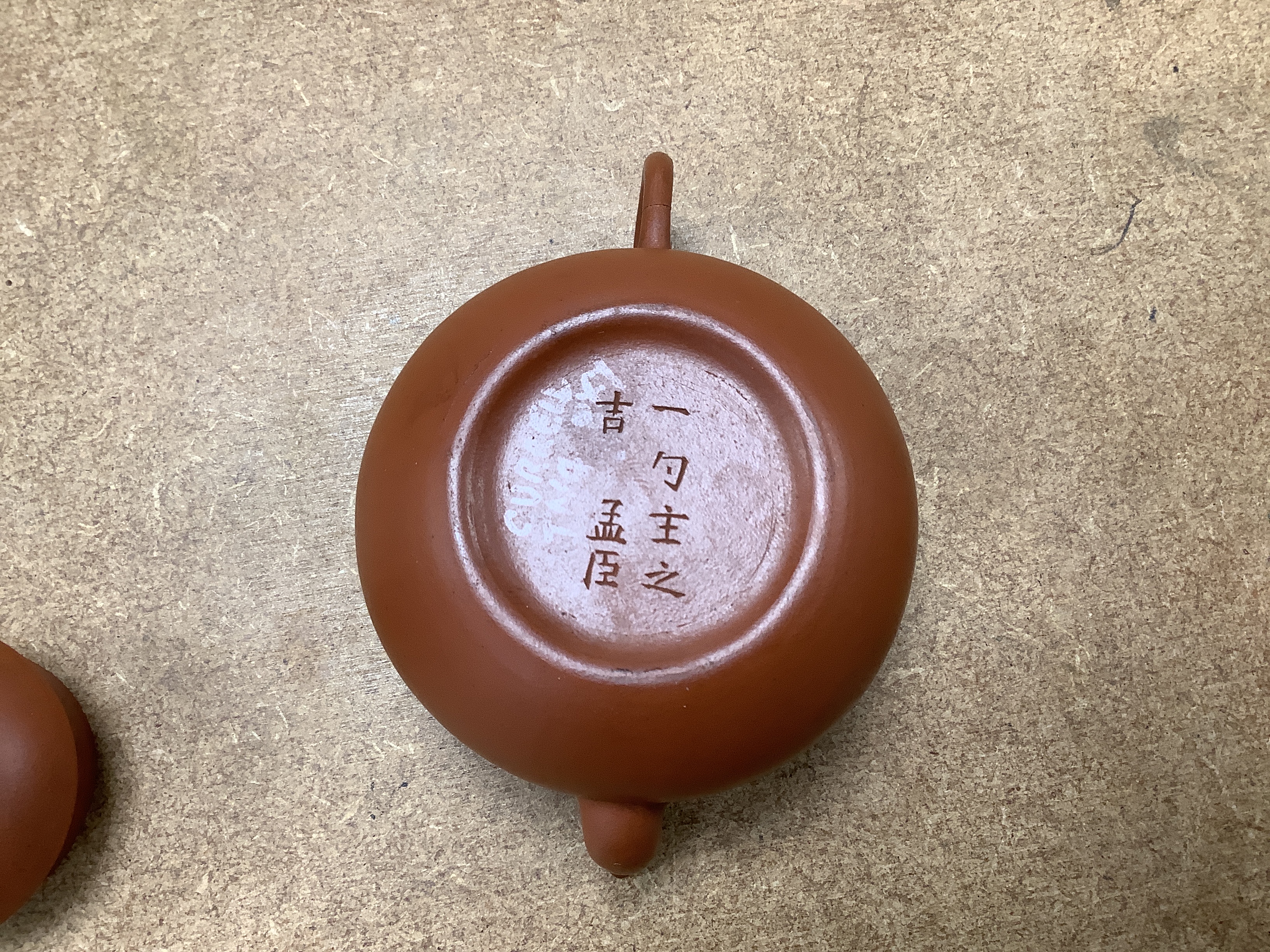 Six Chinese Yixing terracotta teapots, largest 11cm